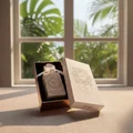 Musk Is Great by Zimaya perfume bottle on linen table near tropical window sunlight fragrance