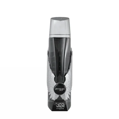 Green perfume bottle with geometric design on a white background