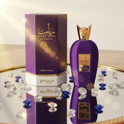Rabab Gems by Zimaya perfume bottle on mirrored tray with jewels gold light luxury unisex fragrance