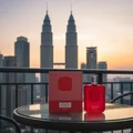 Red Carpet Paragon by Zimaya perfume on balcony KLCC sunset view luxury unisex fragrance