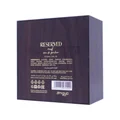 Back of a dark purple perfume kotak with 'Reserved' jenama and butiran produk Malaysia