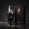 Taraf Black by Zimaya perfume bottle on black marble with golden veins luxury men fragrance