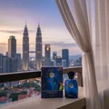 Zimaya evolution perfume bottle and box on balcony KL skyline dusk men fragrance