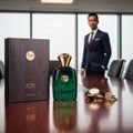 Zimaya Icon perfume bottle and box on boardroom table watch cufflinks men fragrance
