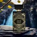 Perfume bottle labeled 'Oud is Great' by Zinqua on a stone surface with a natural background